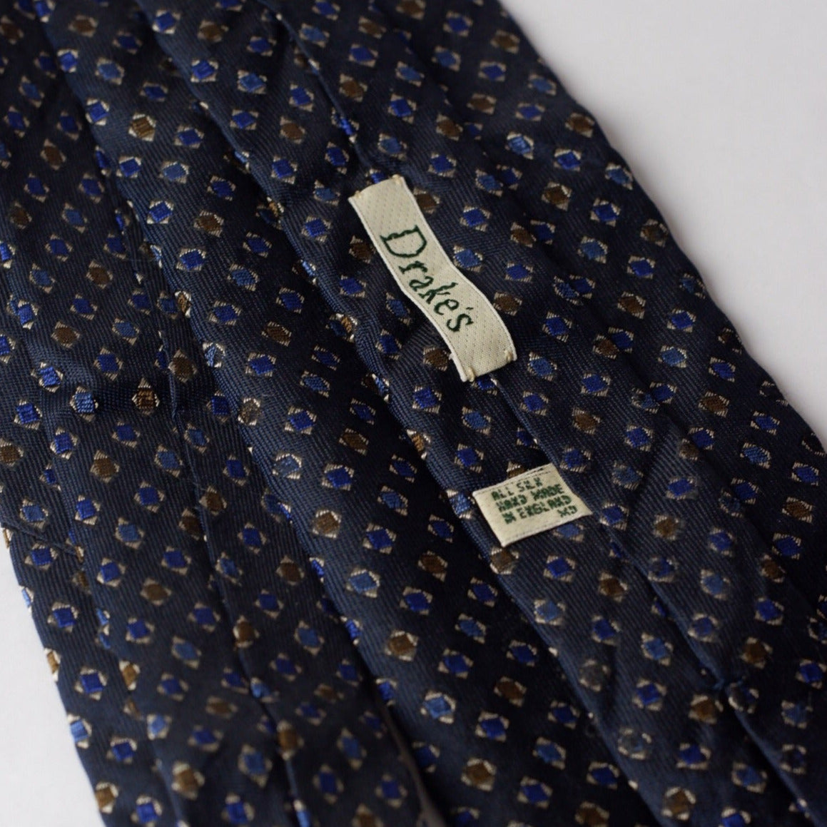 Drake's Navy with Blue and Brown Diamonds Squares Necktie